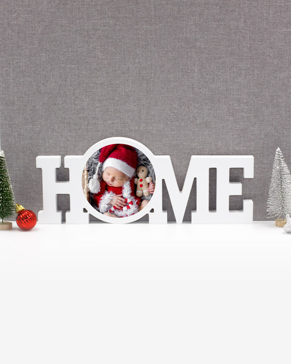 HOME wooden photo frame featuring a baby dressed in holiday attire