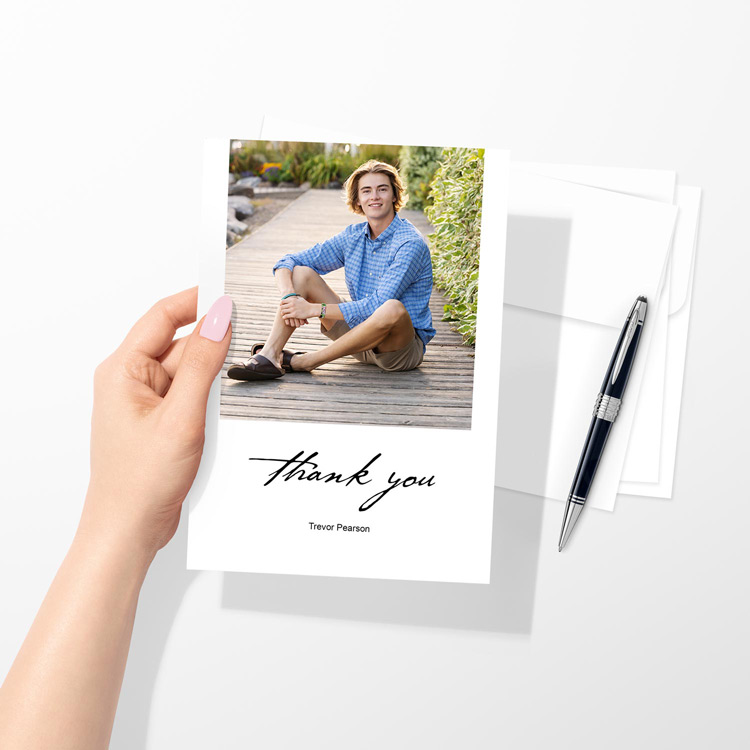 Personalized thank you card featuring a photo, with white envelopes