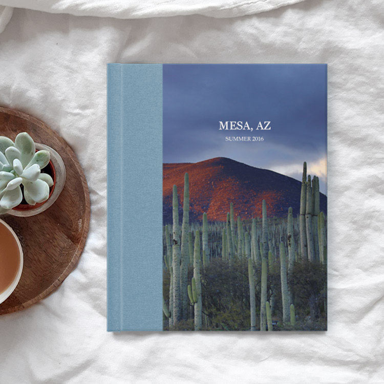 Personalized linen photo book featuring a dusty blue linen cover