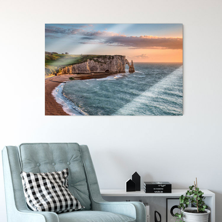Acrylic wall print featuring a scenic coastal landscape, displayed in a modern living space